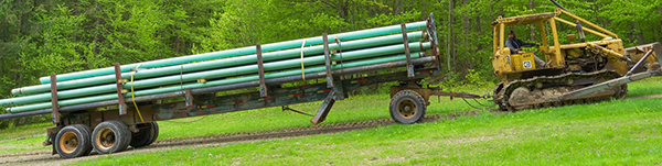 Snowmaking Pipe being pulled up the mountain