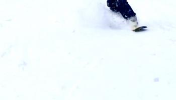 Kid snowboarding 