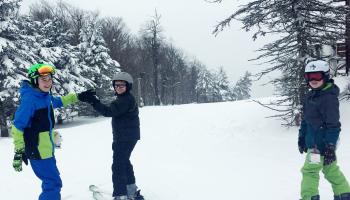 3 Kids Skiing 