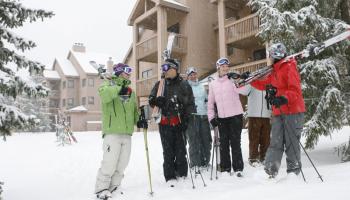 Skiers outside their hotel 